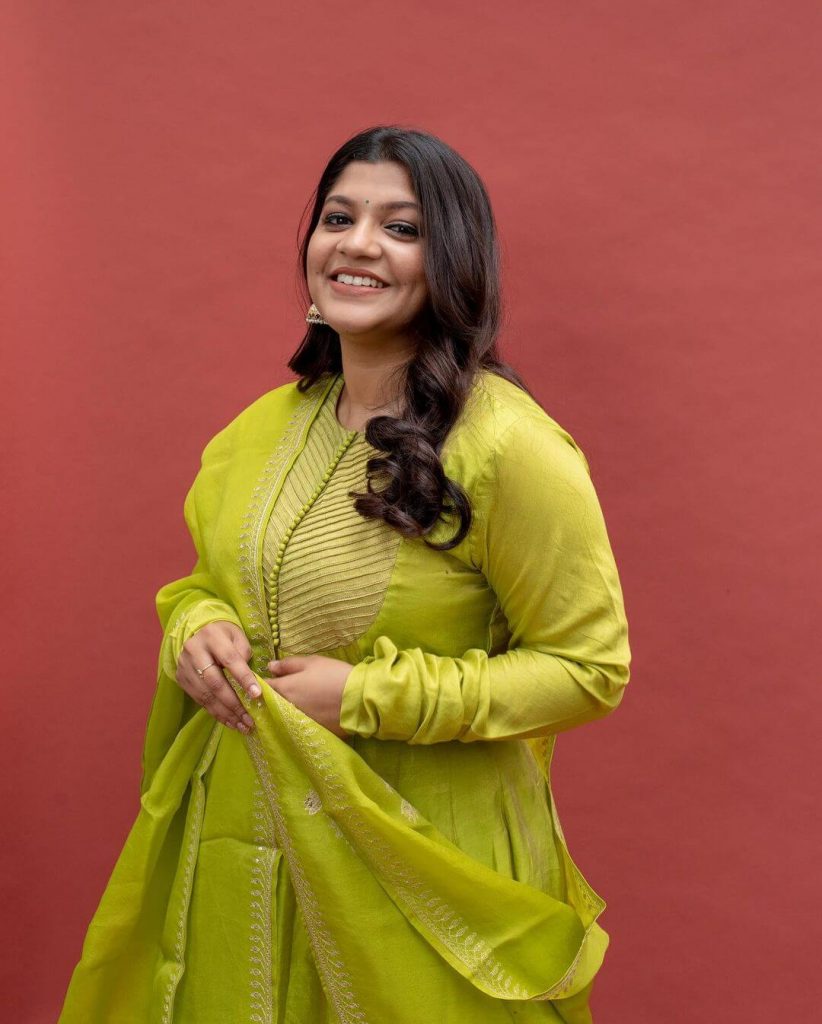 Actress Aparna Balamurali in olive green salwar