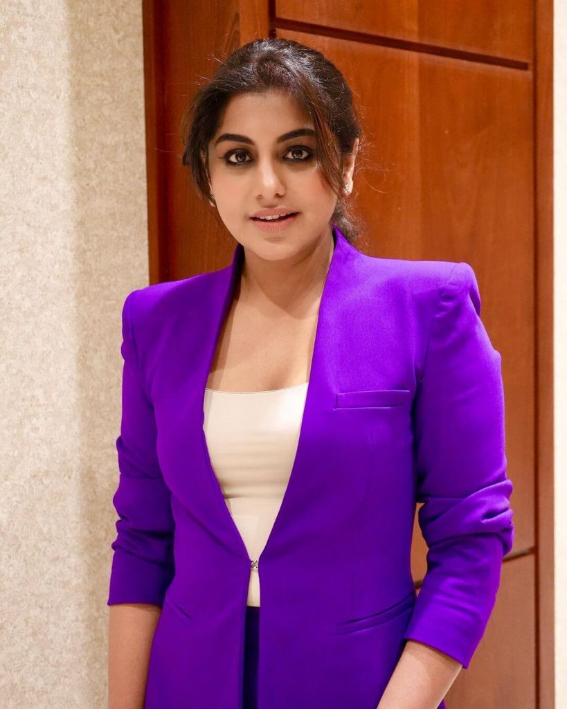 Actress Meera Nandan in violet jacket
