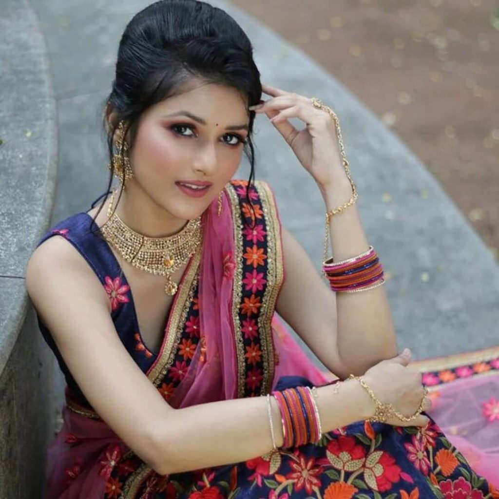 Actress Ayesha Pathan close up in saree and sleeveless blouse