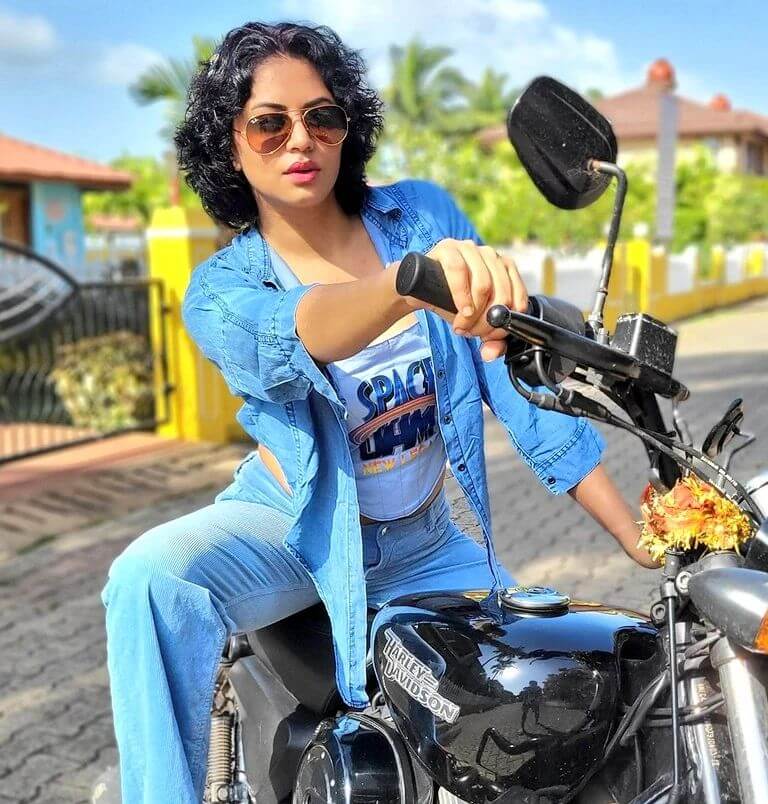 Actress Kavita Kaushik in bike