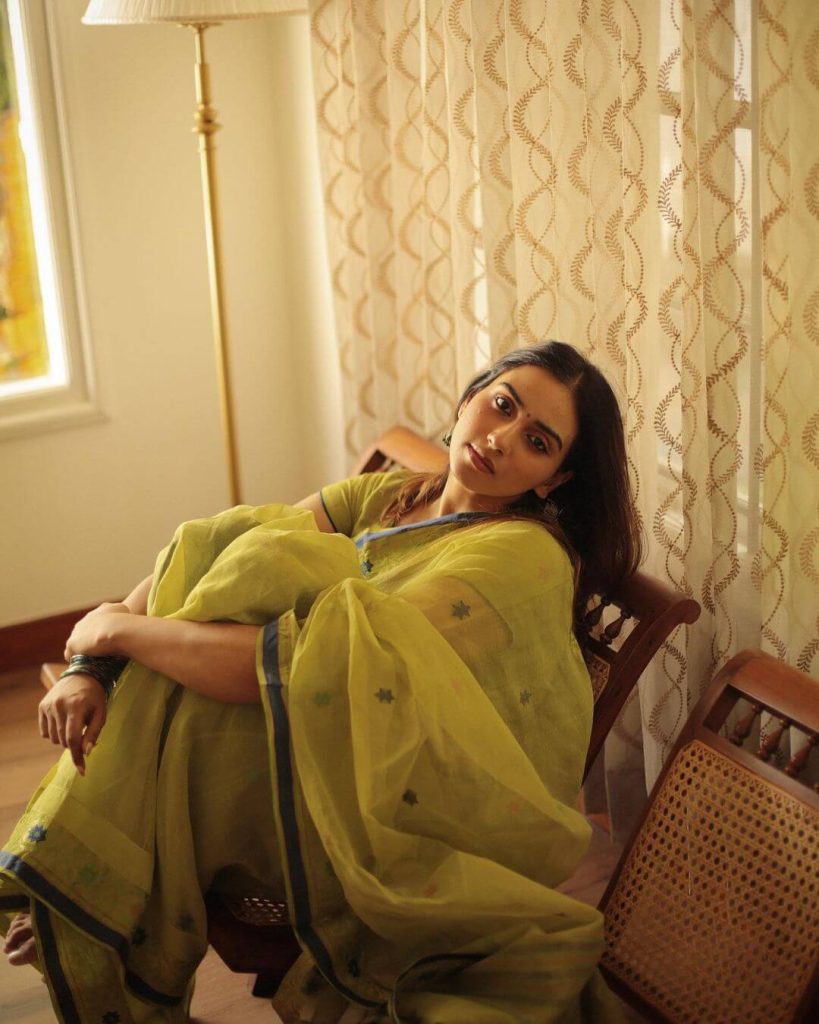 Actress Malavika Jayaram in olive green saree