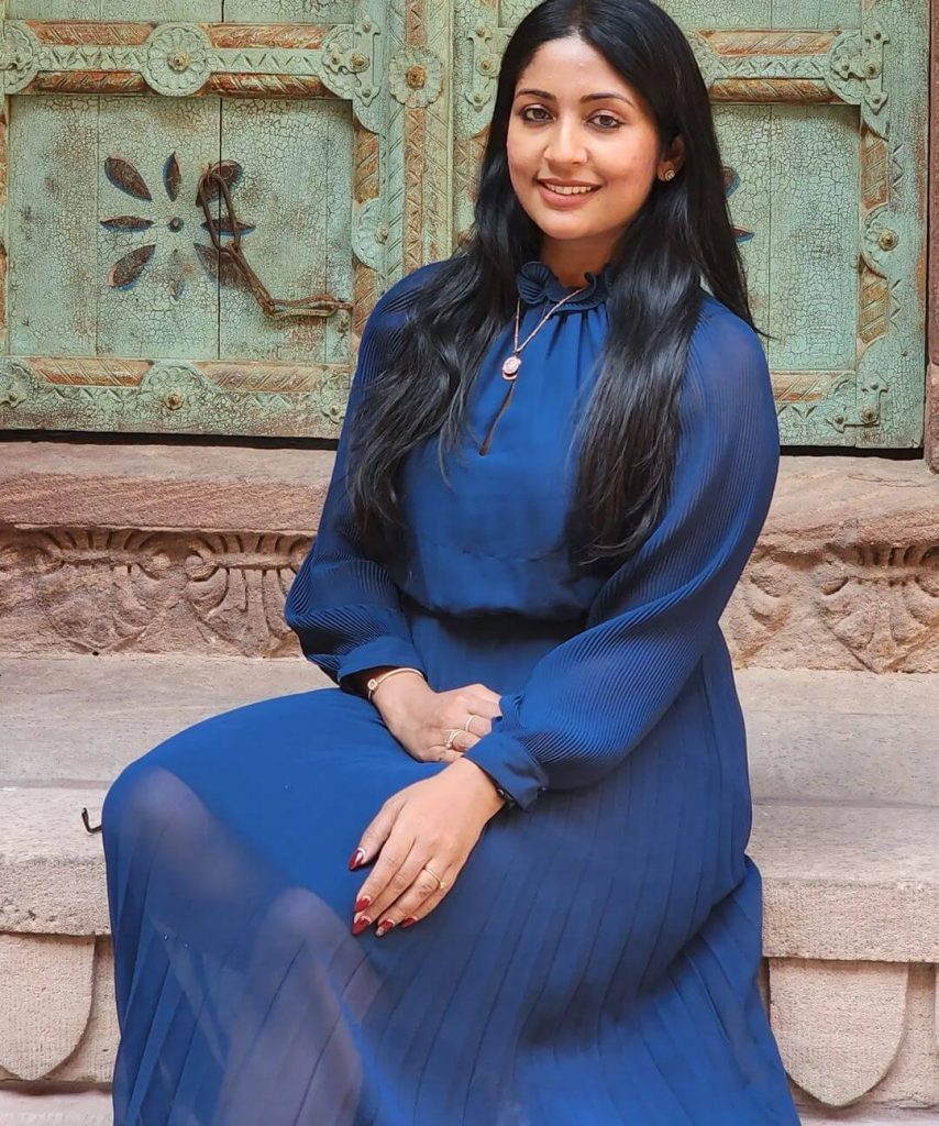 Actress Navya Nair in dark blue outfit