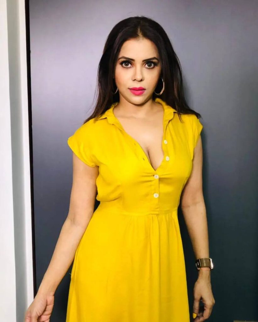 Actress Pooja Poddar in yellow outfit
