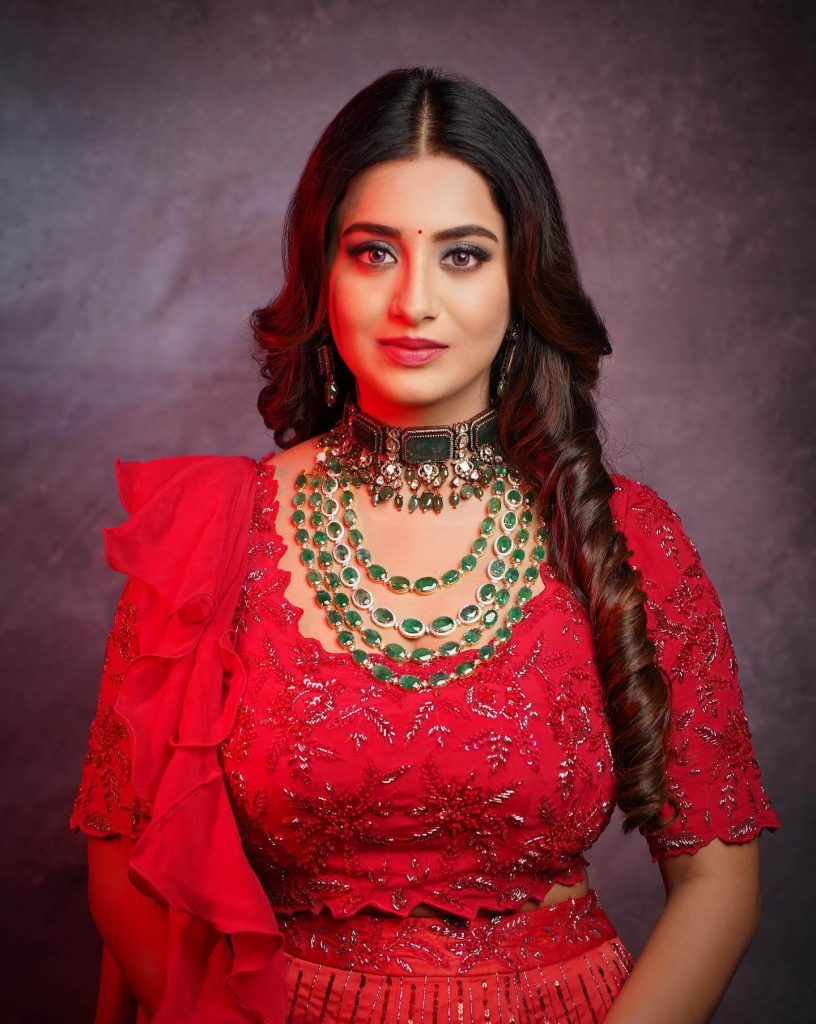 Actress Rashi Singh close up in red outfit