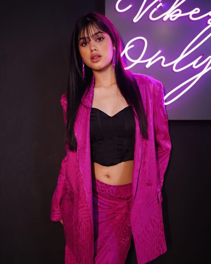 Riva Arora in pink jacket and black inner