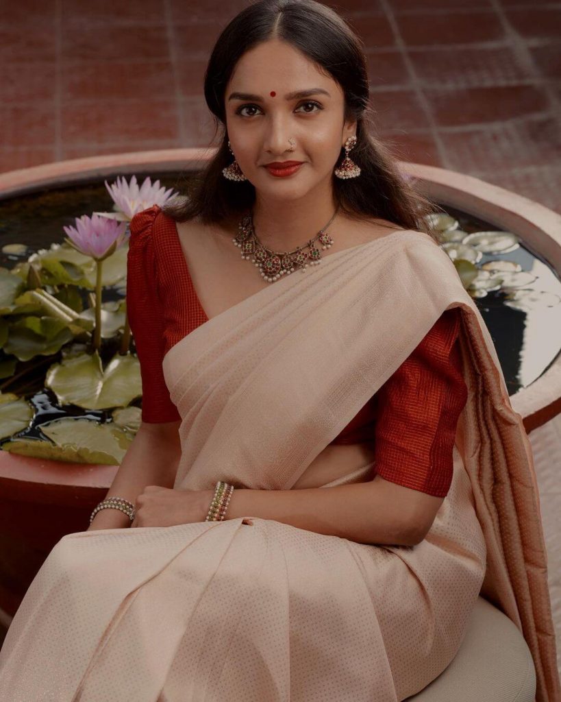 Actress Surabhi Santosh close up in saree