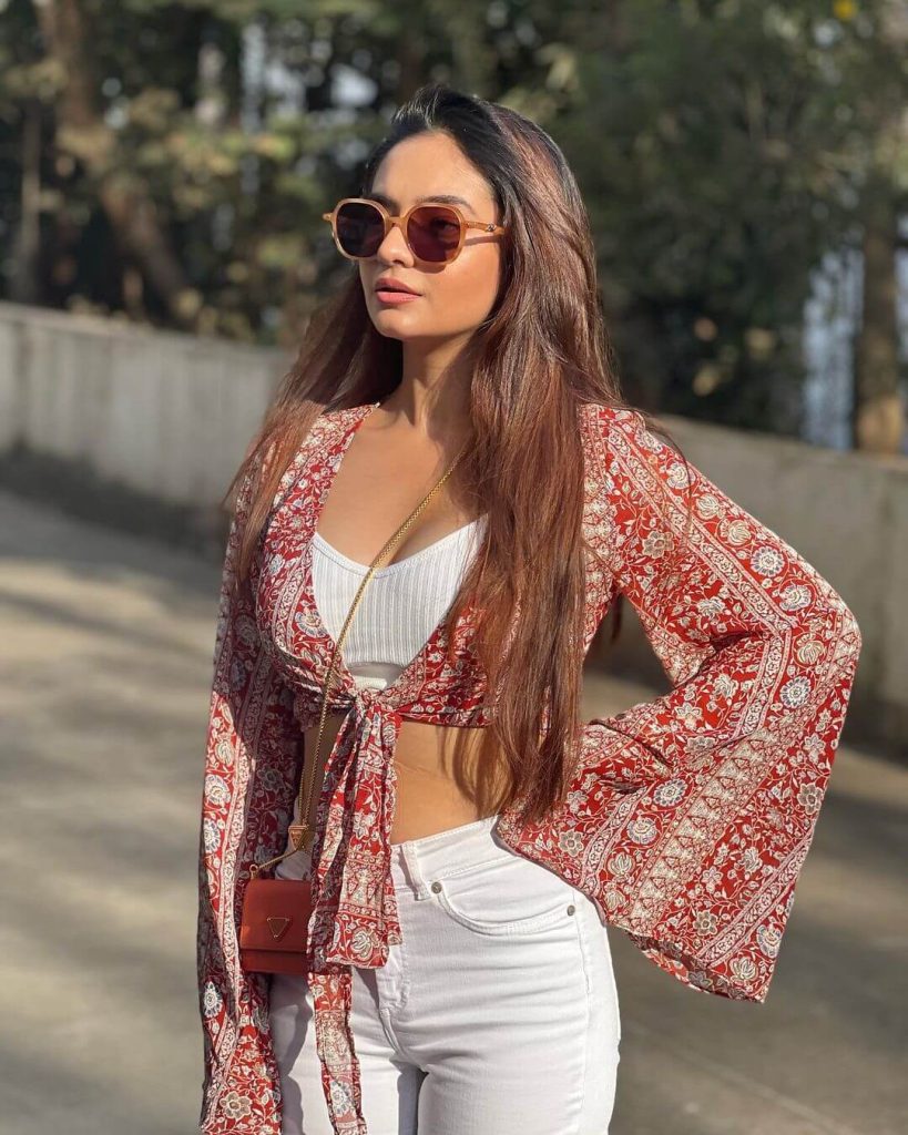 Actress Anushka in Boho floral bell-sleeve crop top paired with white jeans
