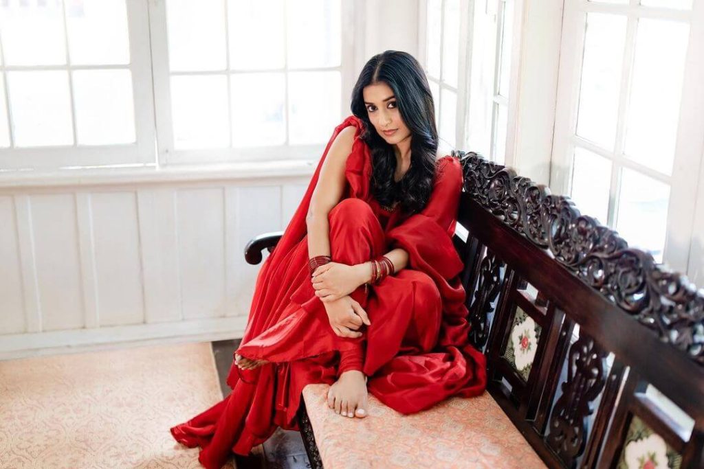 Actress Meera Jasmin in red kurta