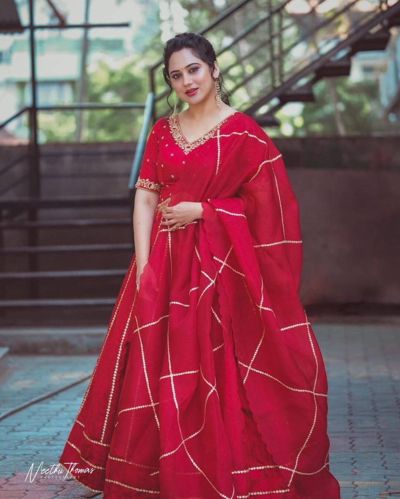 Actress Miya George in Fascinating Red Attire