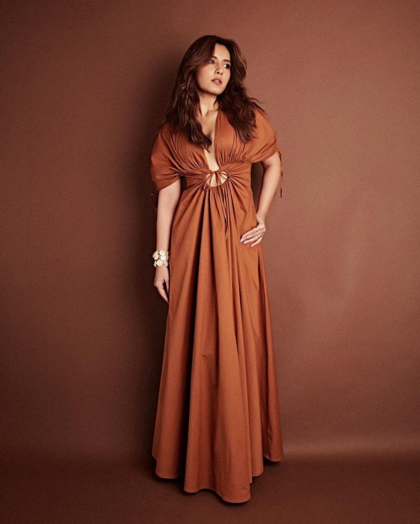 Actress Raashi Khanna in burnt apricot coloured tie front maxi dress