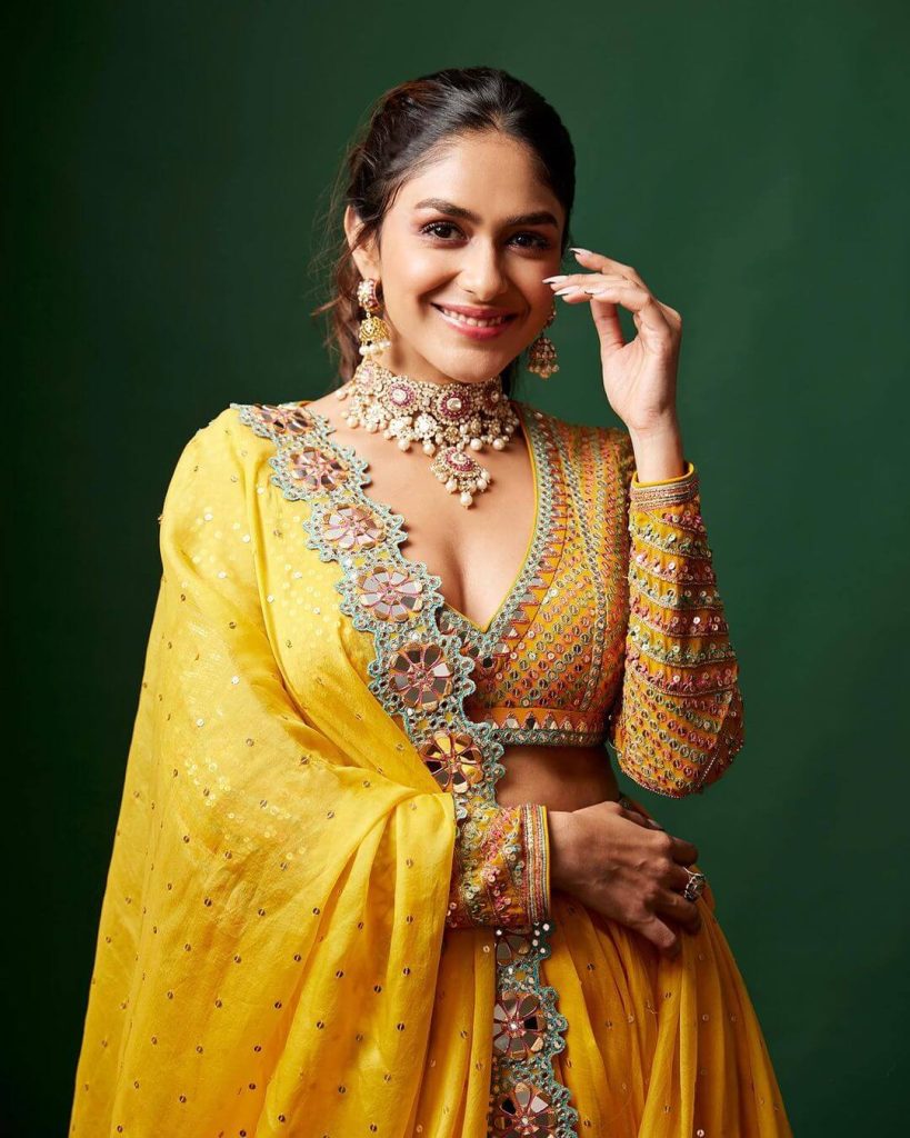 Actress Mrunal Thakur in yellow lehenga