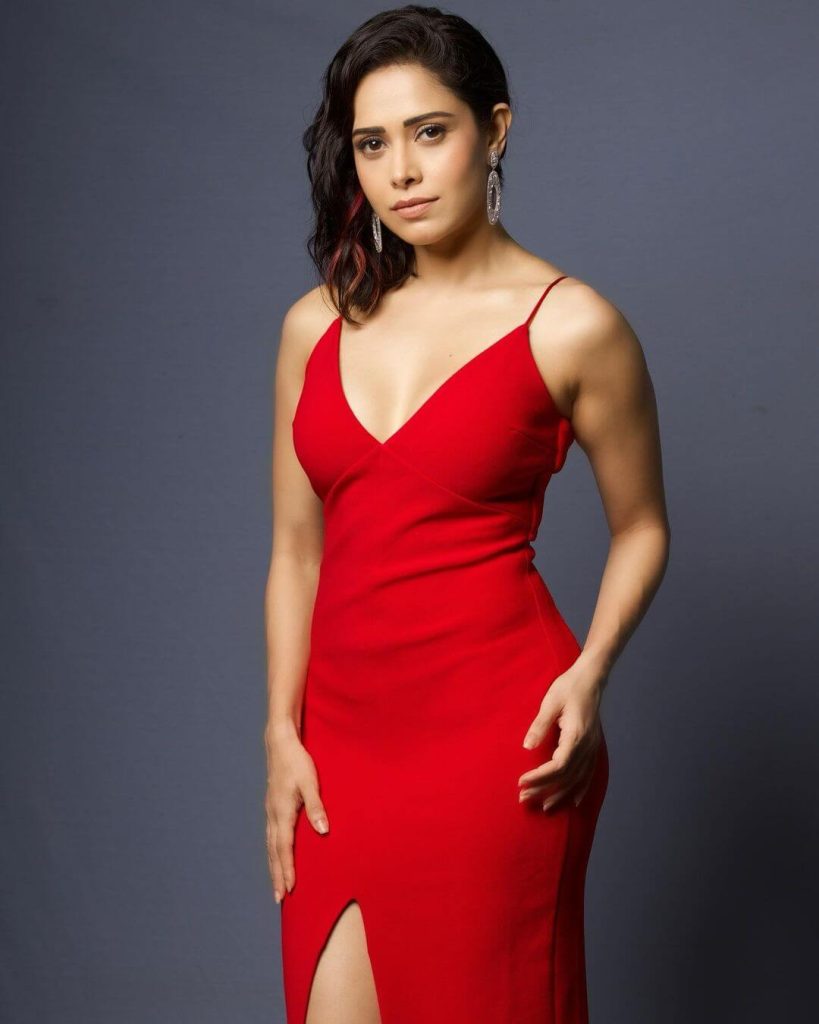 Actress Nushrratt Bharuccha in red sleeveless gown